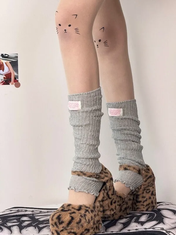 Kitty on knee tattoo tights